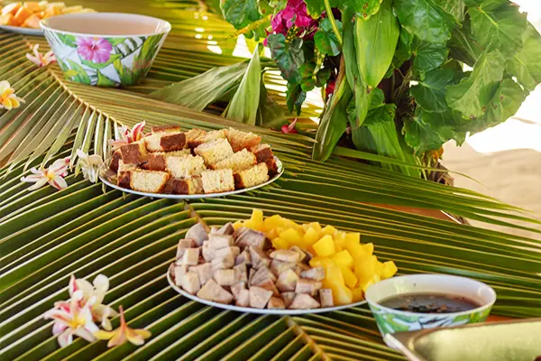 Traditional Polynesian lunch - grilled fish and local specialties Bora Bora